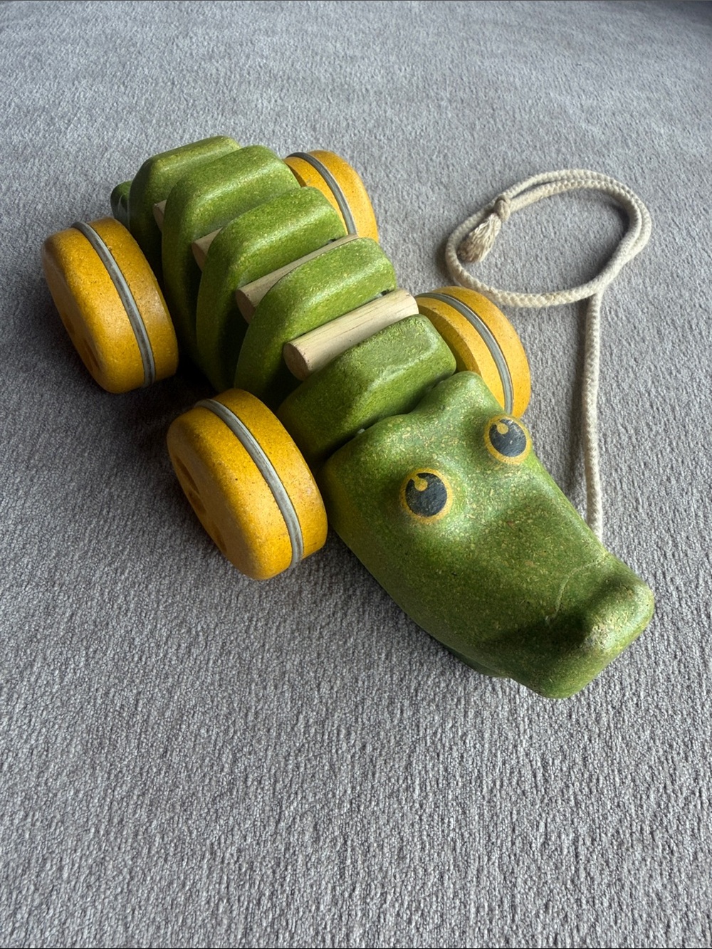 PLAN TOYS Green Pull-Along Crocodile Toy with Yellow Wheels